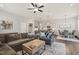 Open-concept living area seamlessly connects living, dining, and kitchen spaces at 797 S Wilma St, Angier, NC 27501