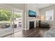 Bright living area with sliding glass doors leading to an outdoor patio space at 797 S Wilma St, Angier, NC 27501