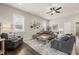 Spacious living room filled with natural light, stylish furniture, and chic decor at 797 S Wilma St, Angier, NC 27501
