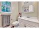 Bathroom with a toilet, sink, and towel rack at 838 Joyner Ct, Wake Forest, NC 27587