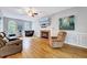 Spacious living room with fireplace, hardwood floors, and comfortable seating at 838 Joyner Ct, Wake Forest, NC 27587