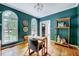 Inviting home office with hardwood floors, natural light, and stylish decor at 838 Joyner Ct, Wake Forest, NC 27587