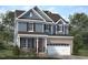 Charming two-story home boasts a brick-accented garage and inviting front porch at Lot 53 Magnolia Acres Ln, Fuquay Varina, NC 27526