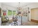 Well-appointed office with custom cabinetry, built-ins, and modern light fixtures at 1004 E Willowbrook Dr, Burlington, NC 27215