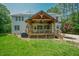 Backyard view of the deck and the rear elevation of the house at 1005 Hidden River Ct, Raleigh, NC 27614