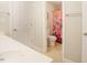 Bright bathroom with a toilet, shower, and a vanity at 1005 Hidden River Ct, Raleigh, NC 27614