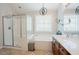 Bright bathroom with a glass-enclosed shower, tub, and double sink vanity at 1005 Hidden River Ct, Raleigh, NC 27614