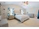 Serene main bedroom with neutral tones, soft lighting, and coordinated furniture for a relaxing atmosphere at 1005 Hidden River Ct, Raleigh, NC 27614