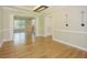 Bright dining room features hardwood floors and is connected to a spacious living area at 1005 Hidden River Ct, Raleigh, NC 27614