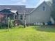 Spacious backyard with well-maintained lawn, gazebo, perfect for outdoor activities at 101 Langston Ridge Dr, Angier, NC 27501