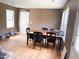 Dining room with hardwood floors, natural light, and ample space for gatherings at 101 Langston Ridge Dr, Angier, NC 27501