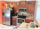 Well-equipped kitchen with stainless steel appliances and ample cabinet space at 101 Langston Ridge Dr, Angier, NC 27501