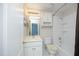 Classic bathroom with white vanity, tub and shower combo, and neutral decor providing a serene atmosphere at 101 Royal Glen Dr, Cary, NC 27518