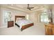 The main bedroom has a trey ceiling, carpet floors, and natural light from two windows at 101 Royal Glen Dr, Cary, NC 27518