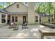 Inviting back deck area perfect for relaxation, featuring comfortable seating and stylish outdoor decor at 107 Wimbledon Ct, Cary, NC 27511