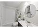 Well-lit bathroom featuring a vanity, toilet, and bathtub with a shower at 107 Wimbledon Ct, Cary, NC 27511