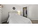 Bedroom with natural light and closet at 107 Wimbledon Ct, Cary, NC 27511