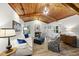 Inviting living room with a fireplace, wood ceiling, and comfortable seating at 107 Wimbledon Ct, Cary, NC 27511