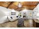 Bright living room with a wood ceiling, fireplace, and stylish furniture at 107 Wimbledon Ct, Cary, NC 27511