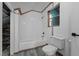 Cozy bathroom with a tub/shower combo, white subway tile, and wood look floors at 1090 S Fifth St, Mebane, NC 27302