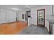 Bright kitchen and living room featuring a laundry station and modern appliances at 1090 S Fifth St, Mebane, NC 27302