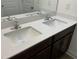 Bathroom vanity with double sinks and ample counter space offering modern convenience and style at 1116 Sidney Creek Dr # 1116, Zebulon, NC 27597