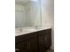 Bathroom vanity with double sinks and ample counter space offering modern convenience and style at 1116 Sidney Creek Dr # 1116, Zebulon, NC 27597