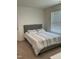Comfortable bedroom with a plush bed, providing a relaxing retreat for rest and rejuvenation at 1116 Sidney Creek Dr # 1116, Zebulon, NC 27597