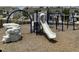 Community playground with slides, climbing structures, and a soft landing surface for children at 1116 Sidney Creek Dr # 1116, Zebulon, NC 27597