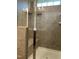 Shower featuring a glass door, tiled walls, and a built-in seat at 1116 Sidney Creek Dr # 1116, Zebulon, NC 27597