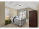 Bedroom with neutral walls, carpet, and natural light from the window at 121 Fort Jackson Rd, Morrisville, NC 27560