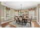 Formal dining room with hardwood floors, crown molding, and natural light at 121 Fort Jackson Rd, Morrisville, NC 27560