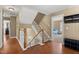 Inviting entryway features hardwood floors, stairs to the second level, and access to adjacent rooms at 121 Fort Jackson Rd, Morrisville, NC 27560