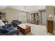 Living room featuring neutral carpet, sofa and armchair, and natural light at 121 Fort Jackson Rd, Morrisville, NC 27560