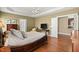 Bedroom with hardwood floors, ceiling fan and ensuite bathroom at 121 Fort Jackson Rd, Morrisville, NC 27560