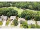 An aerial view of beautiful homes surrounding a lush green golf course at 1211 E Pointe Dr, Durham, NC 27712