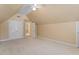Large bedroom with neutral walls and carpet, ceiling fan, and double door closet at 1211 E Pointe Dr, Durham, NC 27712