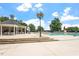 Community pool deck with an outdoor dining area, lounge chairs, and views of the pool at 1211 E Pointe Dr, Durham, NC 27712