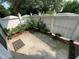 Private patio featuring a concrete floor and white fencing, perfect for outdoor relaxation at 1402 Barton Place Dr, Raleigh, NC 27608