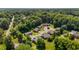 Scenic aerial view of a residential neighborhood surrounded by lush greenery at 1731 Malone Rd # A, Burlington, NC 27215