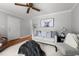 Cozy living room with neutral tones, ceiling fan, hardwood floors, and minimalist decor at 1731 Malone Rd # A, Burlington, NC 27215