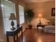Bright living space with large windows, comfortable seating, and classic furniture at 1913 Rendall St, Burlington, NC 27215