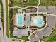 Overhead view of the community amenities featuring two pools, clubhouses, playgrounds and parking at 200 Cloud Berry Ln, Holly Springs, NC 27540