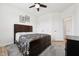 Spacious bedroom with a large bed, ceiling fan and lots of natural light at 200 Cloud Berry Ln, Holly Springs, NC 27540