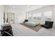 Bedroom featuring lots of natural light, plush carpeting, and neutral walls at 200 Cloud Berry Ln, Holly Springs, NC 27540