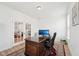Bright office featuring hardwood floors, a window and french doors at 200 Cloud Berry Ln, Holly Springs, NC 27540