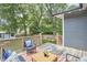 Spacious back deck with outdoor seating, perfect for entertaining and enjoying nature at 2031 Englewood Ave, Durham, NC 27705