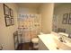 Bathroom featuring framed inspirational quotes, a toilet, and vanity with mirror, and a shower curtain at 2039 Alderman Way, Creedmoor, NC 27522