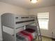 Bedroom featuring a gray bunk bed with side ladder at 2039 Alderman Way, Creedmoor, NC 27522
