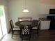 Inviting dining area featuring a round table with chairs, perfect for Gathering meals at 2039 Alderman Way, Creedmoor, NC 27522